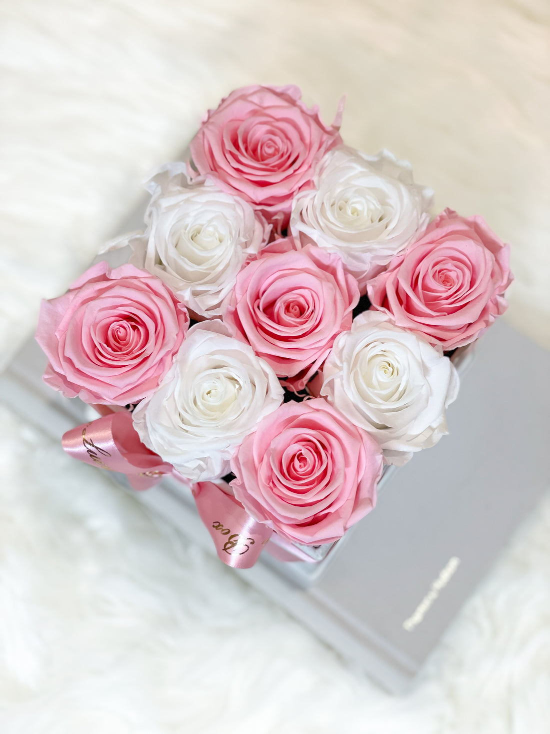 Pink and white infinity roses for valentine's day gift delivery