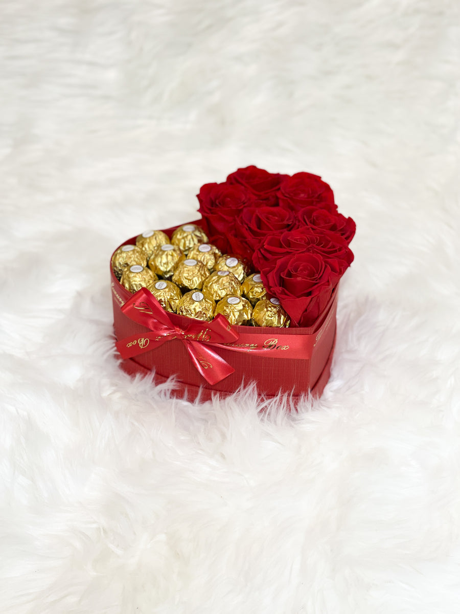 Red infinity roses and chocolate for Valentine's Day delivery in heart shaped box