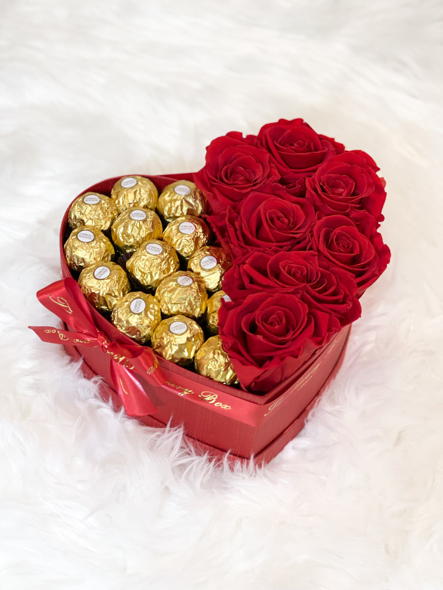 Red infinity roses and chocolate for Valentine's Day delivery in heart shaped box