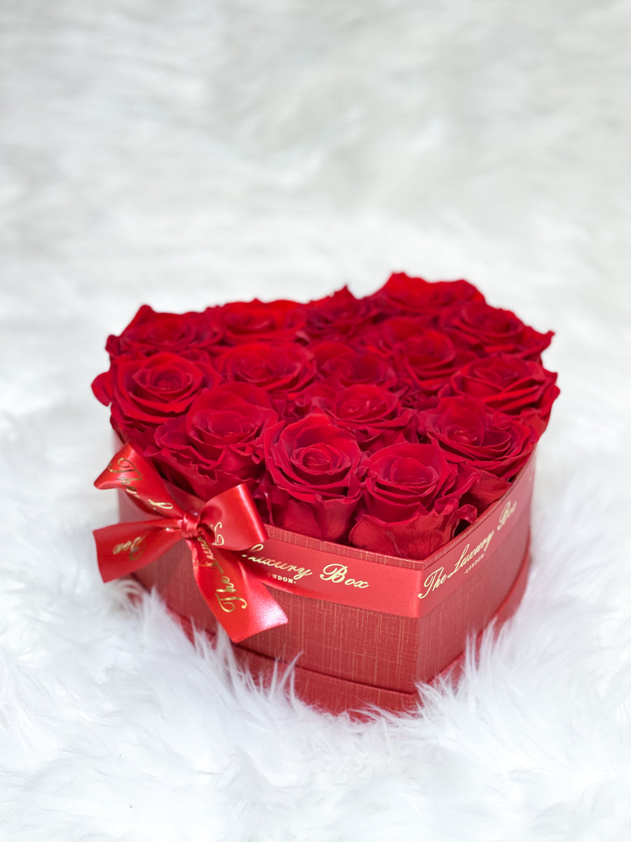 Red infinity roses for Valentine's Day delivery in heart shaped box