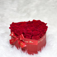 Red infinity roses for Valentine's Day delivery in heart shaped box