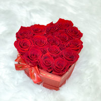 Red infinity roses for Valentine's Day delivery in heart shaped box