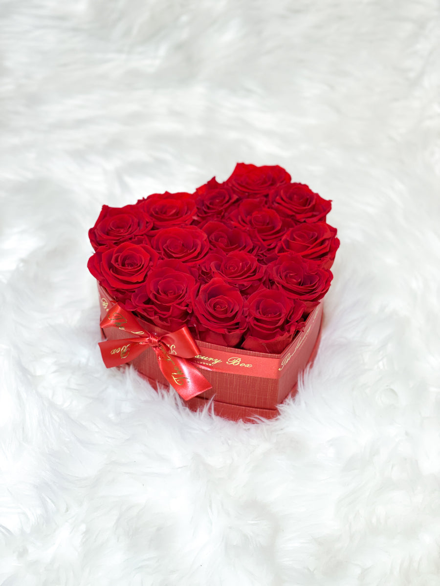 Red infinity roses for Valentine's Day delivery in heart shaped box