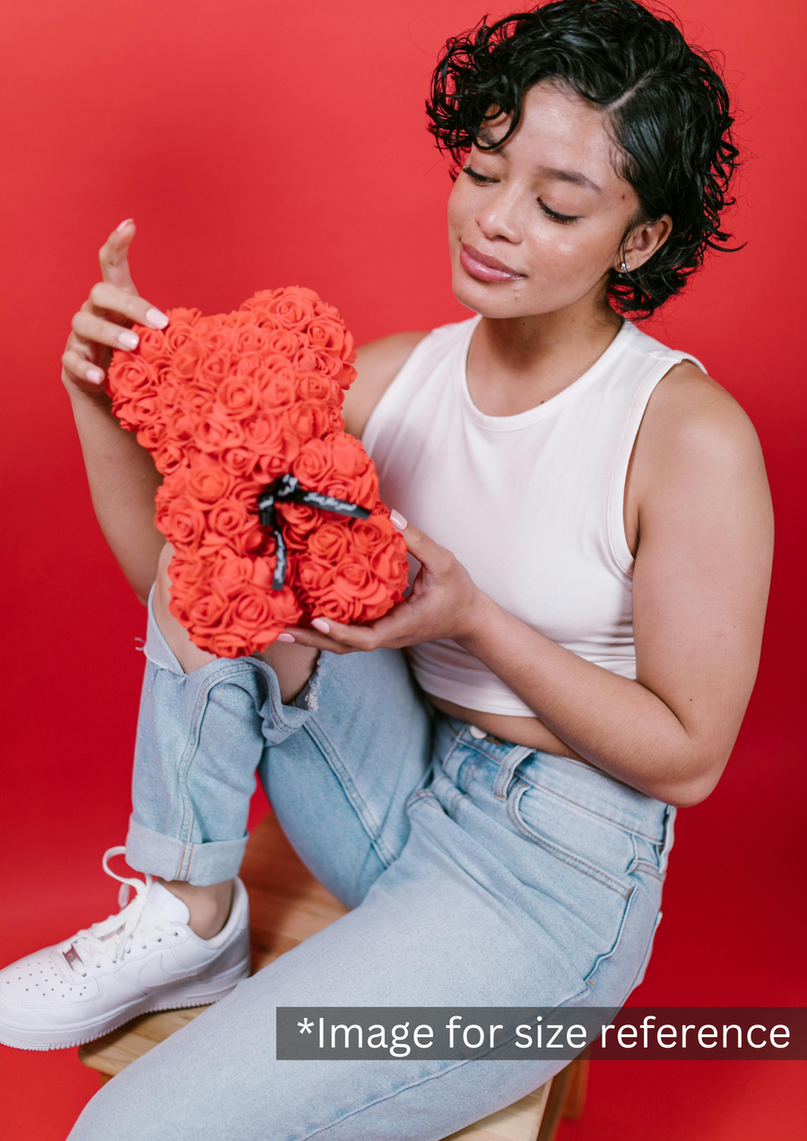 small rose teddy bear made of flowers